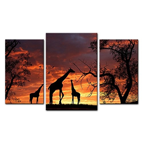Wandbild - Giraffen im Sonnenuntergang - Bild auf Leinwand - 100x60 cm dreiteilig - Leinwandbilder - Tierwelten - Afrika - Silhouetten von Giraffen in der Steppe