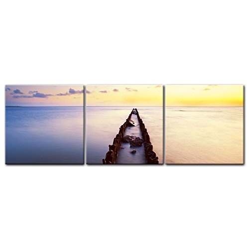 Wandbild - Sonnenuntergang über der Nordsee - Friesland - Bild auf Leinwand - 180x60 cm dreiteilig - Leinwandbilder - Landschaften - Holzbuhne im Meer - Richtung Sonnenaufgang - stimmungsvoll