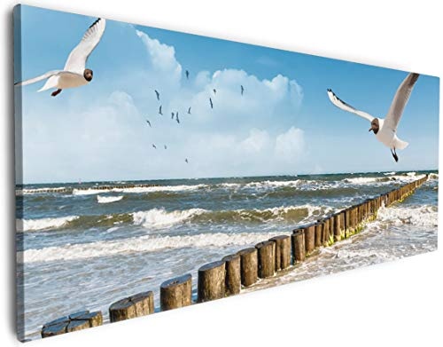 Wallario XXL Leinwandbild Fliegende Möwe am Strand - 60 x 150 cm Brillante lichtechte Farben, hochauflösend, verzugsfrei