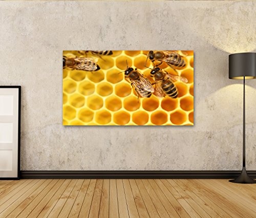 islandburner Bild Bilder auf Leinwand Einige Bienen gehen mit gelben Zellen im Hintergrund Wandbild Leinwandbild Poster DDY