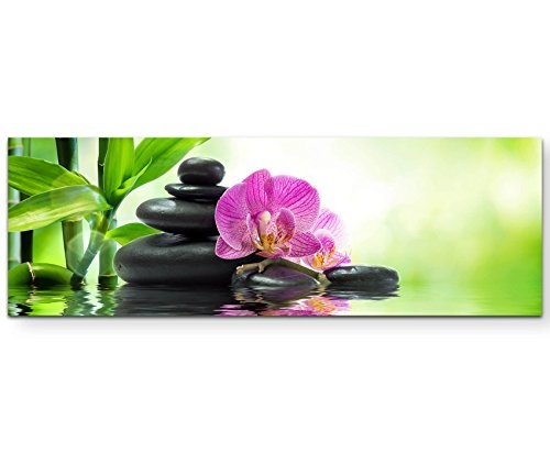Paul Sinus Art Leinwandbilder | Bilder Leinwand 120x40cm Pinke Orchideen Schwarze Steine und Bambus auf Dem Wasser