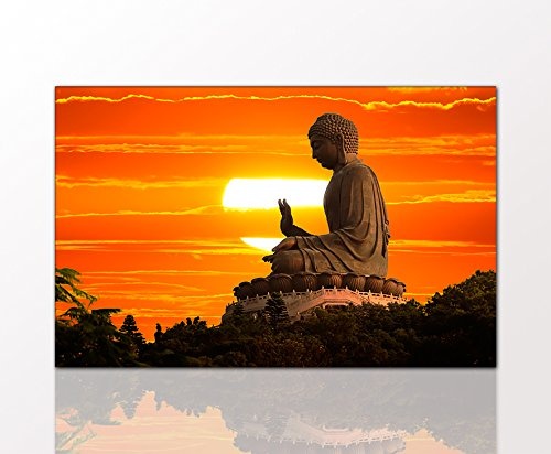 Wandbild "Buddha statue over sunset" 70 x 110cm...