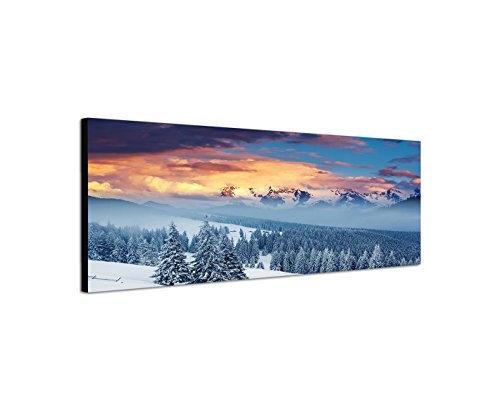 Wandbild auf Leinwand als Panorama in 120x40 cm Toller Sonnenaufgang in den Bergen die Schneebedeckt sind. Bäume verschneit. Bild in tollen Farben die wärme ins Zimmer bringen.