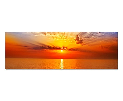 Wandbild auf Leinwand ( Leinwandbild ) als Panorama in 120x40 cm Wunderschöner Sonnenuntergang am Meer mit tollen warmen rötlichen Farben, Wolken Sonnenaufgang. Sonne spiegelt sich im Wasser!