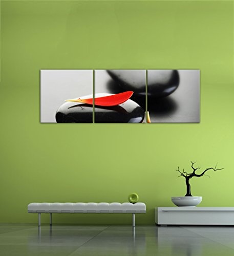 Wandbild - Zen Steine XIV - Bild auf Leinwand - 180x60 cm dreiteilig - Leinwandbilder - Geist & Seele - Erholung - Wellness - Schwarze Zensteine mit roten Blütenblättern