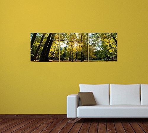 Wandbild - Blätterfall im Herbst - Bild auf Leinwand - 180x60 cm 3tlg - Leinwandbilder - Landschaften - Wald - Park - Jahreszeit - Sonnenschein