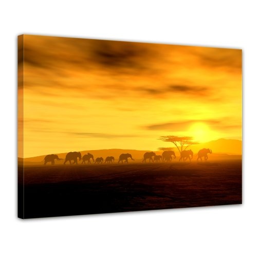 Wandbild - African Spirit - Die Wanderung der Elefanten - Bild auf Leinwand - 80x60 cm 1 teilig - Leinwandbilder - Tierwelten - Natur - Afrika - Elefantenherde vor Einem Sonnenuntergang