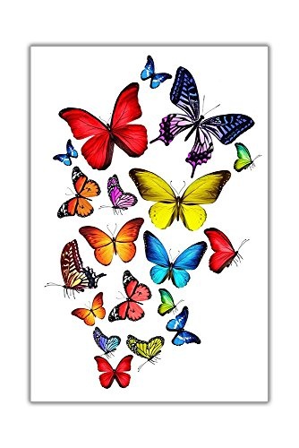 Fliegende bunte Schmetterlinge auf einer gerahmten...