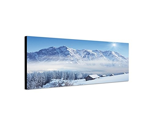 Wandbild auf Leinwand als Panorama in 150x50cm Winterlandschaft Berge Wald Häuser Schnee