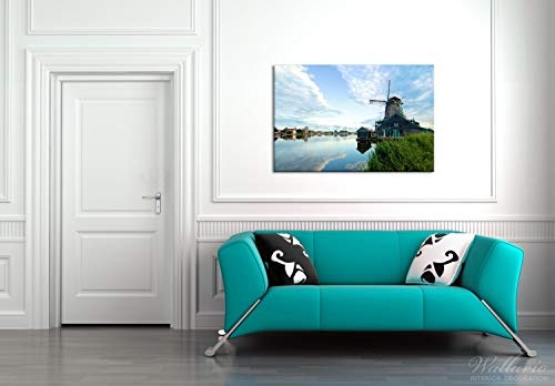 Wallario Leinwandbild Alte Windmühle an Einem Fluss - 60 x 90 cm in Premium-Qualität: Brillante lichtechte Farben, hochauflösend, verzugsfrei