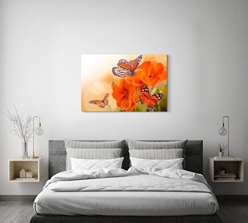 Paul Sinus Art Leinwandbilder | Bilder Leinwand 120x80cm orangene Blumen mit Schmetterlingen