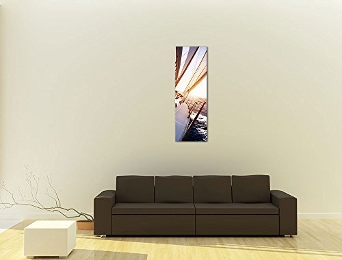 Keilrahmenbild - Yacht auf See - Bild auf Leinwand - 40x120 cm einteilig - Leinwandbilder - Urlaub, Sonne & Meer - Boot im Sonnenaufgang - Blick vom Deck